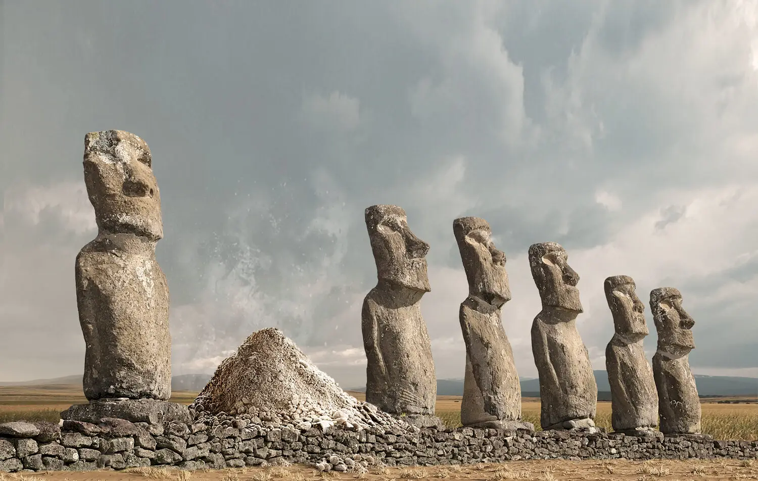 Image of Easter Island statues with one turned to dust.